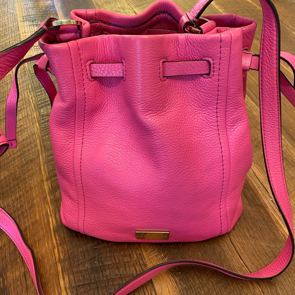 Kate Spade pebble grain leather drawstring bucket purse in bright pink!